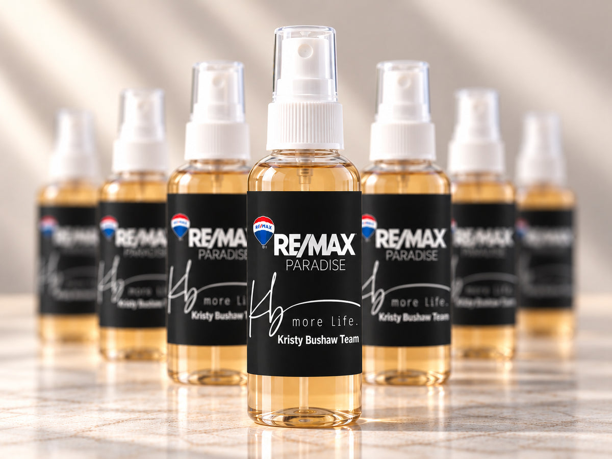 Custom-branded RE/MAX Paradise client gift sprays produced by High Cotton Bath Co.